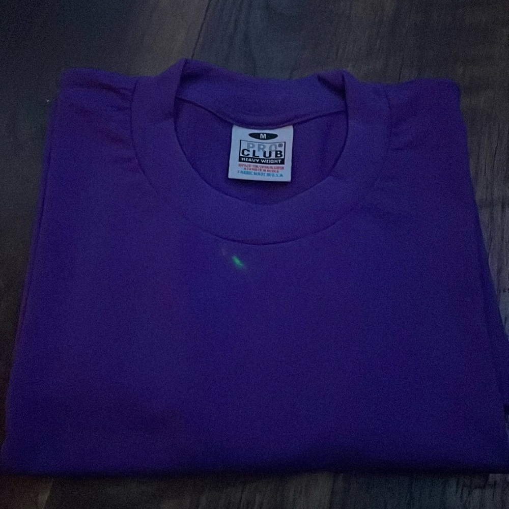 size medium, pro club shirt never been worn before